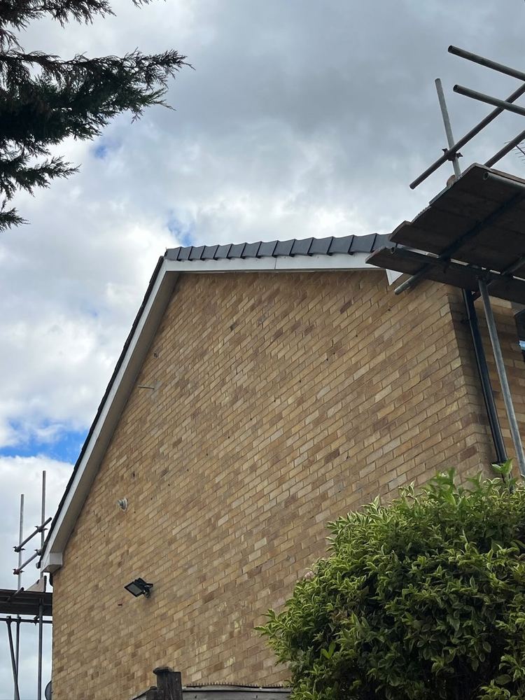 Gable end finished with a new ridge and roofline