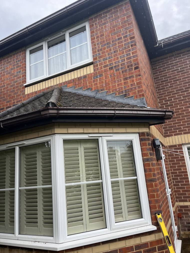 Bay window with new guttering