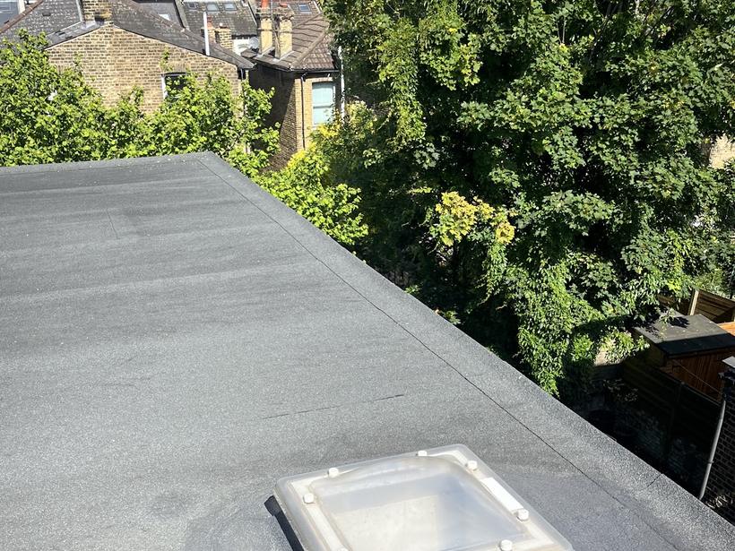 Finished flat roof with new skylight