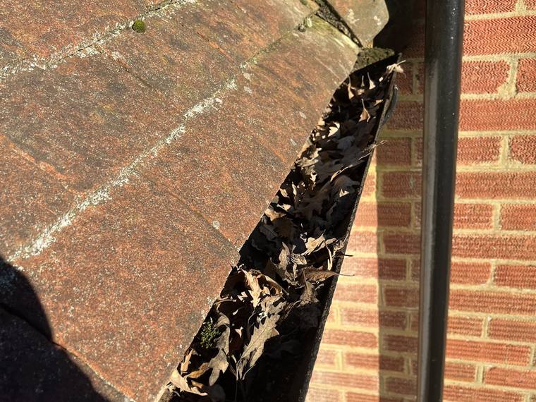 Blocked gutter cleared out