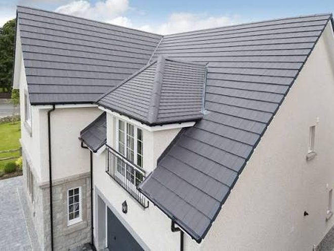 New tiled roof on a detached house